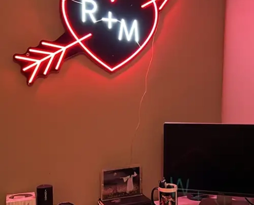 R+M LED Neon Flex design hanging on a wall.